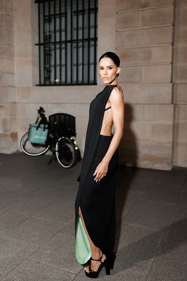 Street style at Paris Fashion Week: black backless maxi dress, mint lining, heels, Paris