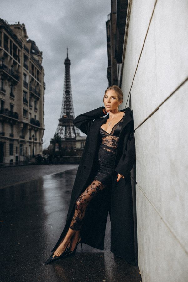 Portrait of a woman in black lace dress, black long coat, Paris
